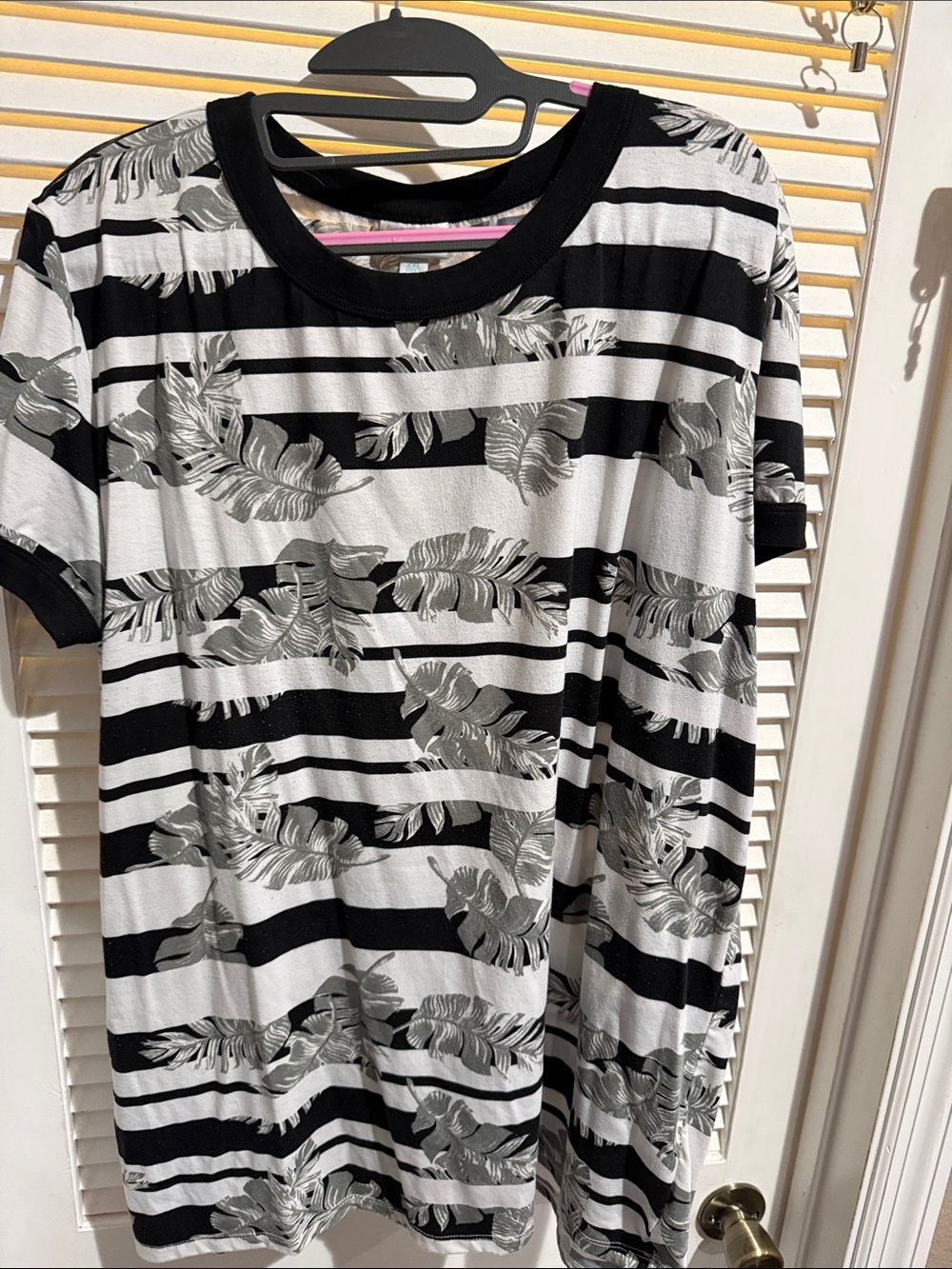LuLaRoe Black & White Striped Tee with Tropical Leaf Motif